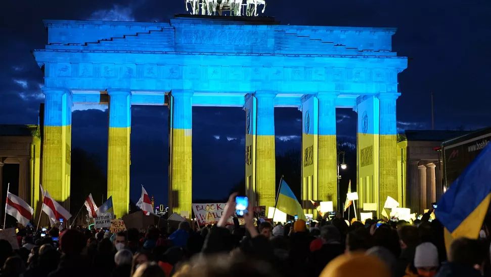The Brandenburg Gate lit up in the colours of the Ukraine flag. 
