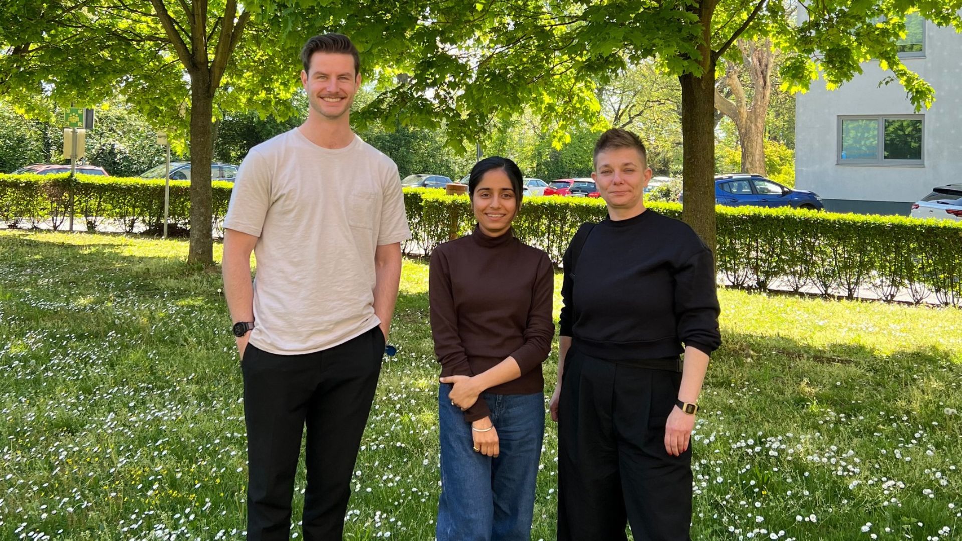 Three people standing ​​Dr. Timothy Warwick, Doctoral Student Astha Khanduri and Klaus Tschira Boost Fund Program Manager Dr. Birte Seffert ​ 