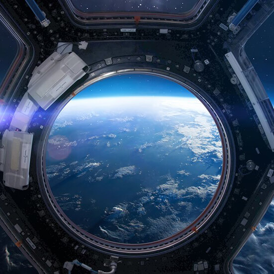 View of planet Earth through a porthole on the International Space Station (ISS).