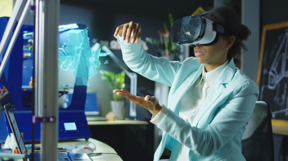 A female researcher with virtual reality glasses is working in a lab