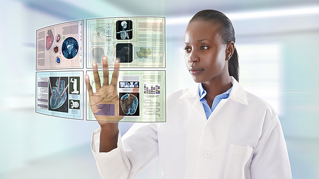 African American doctor using digital display