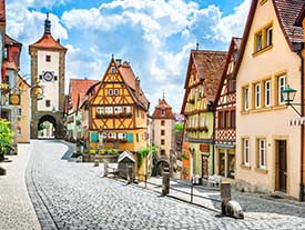 A view of cobblestone streets and old houses in Rothenburg ob der Tauber. 